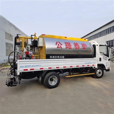 Réservoir distributeur d'asphalte